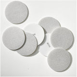 Sunmight Flex Foam Film 3" Vacuum Grip Sanding Discs, collection of discs spread out